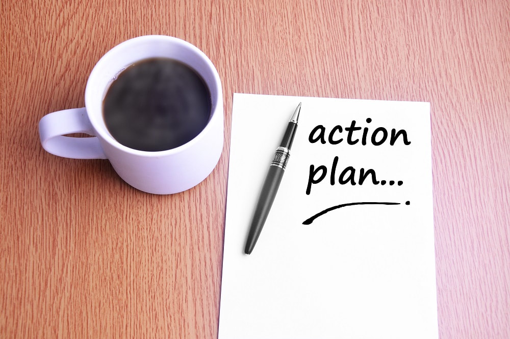 Five steps to take when preparing for mediation_blog image coffee and paper that says action plan_blog image for Mediation Services London